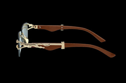 Gafas de sol con detalle de jaguar dorado en patillas y montura negra con brazos marrones